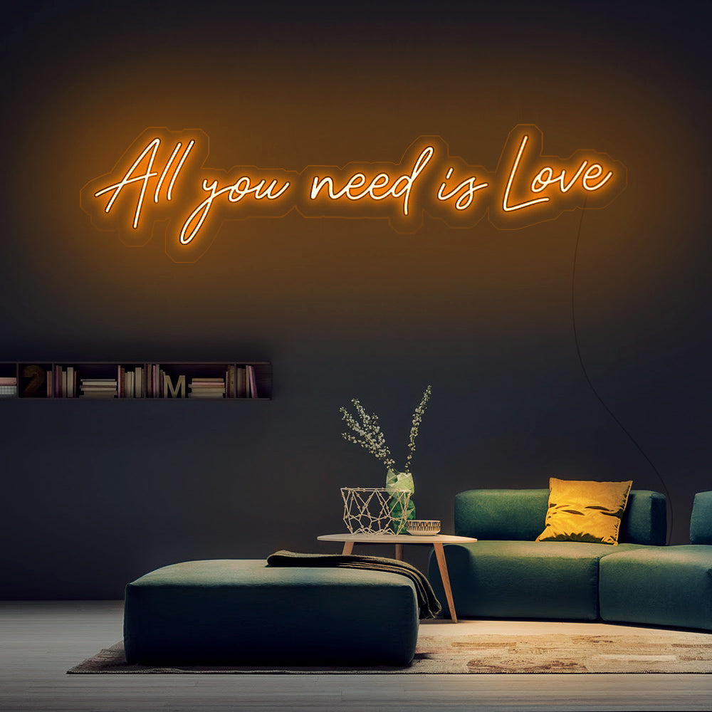 Oranje moderne LED neon verlichting All You Need Is Love voor in de slaapkamer.