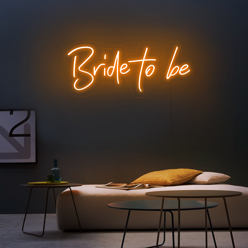 Oranje Bride to Be neon verlichting in een feestelijke bruidssuite - warme LED neon lamp voor een gezellige ambiance