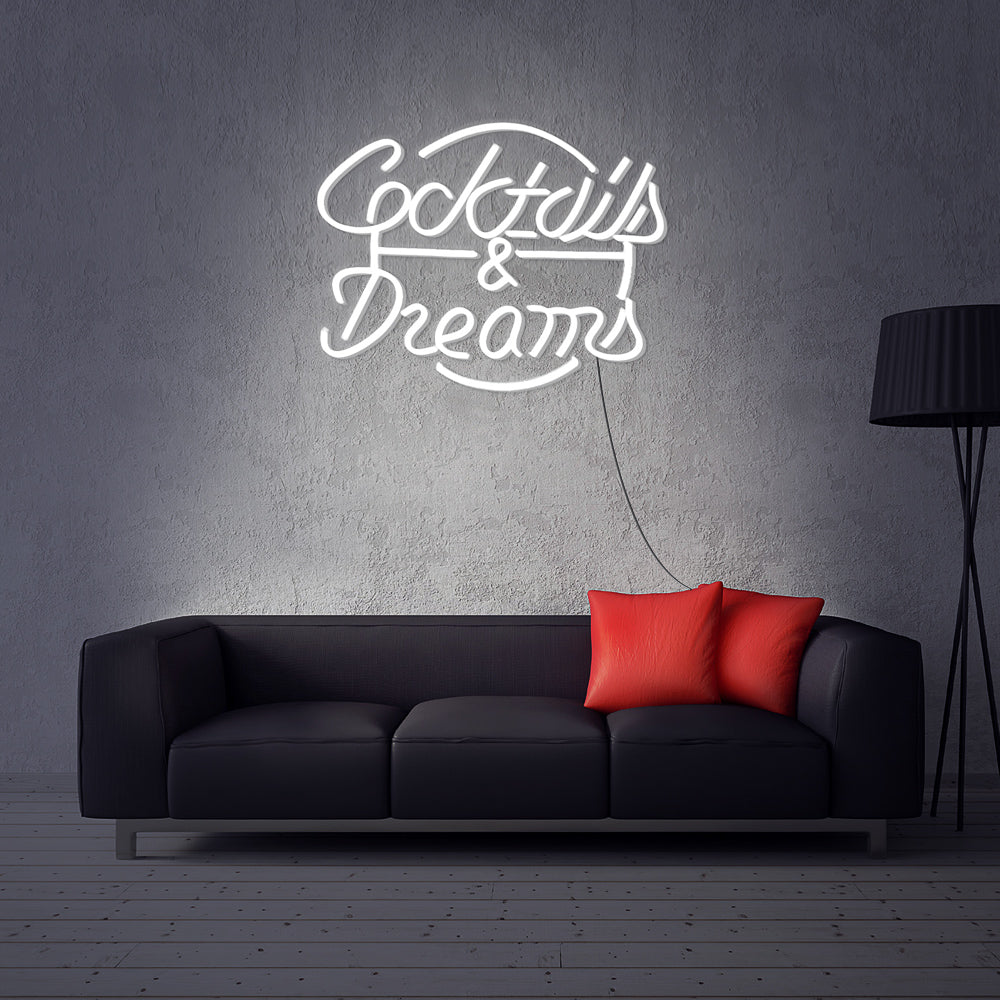 Witte Cocktails and Dream neon sign in een minimalistische woonkamer - strak LED neon verlichting met 2 jaar garantie